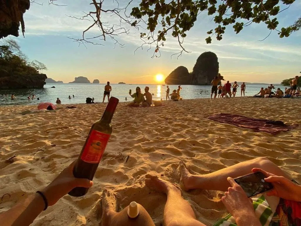 Enjoying the sunset at Phra nang beach with a bottle of wine
